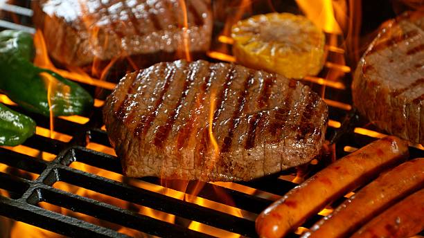 istock Close-up of Beef Steak on a Grill 2225374876