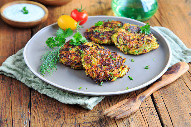istock Zucchini pancakes with Greek yogurt 2225375529
