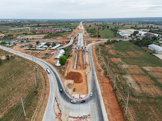 istock The construction site before the construction of the concrete bridge over the intersection by crane workers, tractors, and backhoes 2225376268