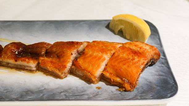 istock Chinese sauce grilled eel fish with copy space 2225376339
