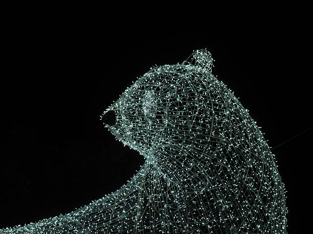 Taitung, Taiwan - November 9, 2024 - A close-up view of a large, glowing polar bear-shaped light sculpture, made of numerous tiny lights, at the Taitung Tiehua Lantern Festival