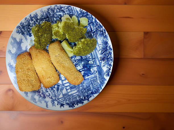 Breaded tilapia fillet with broccoli salad