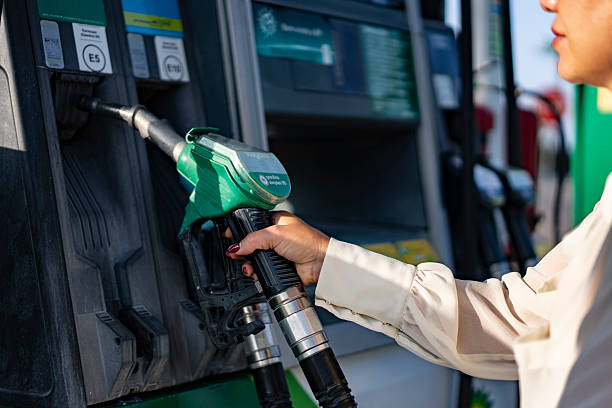 istock Human hand holding a fuel pump handle 2225381638