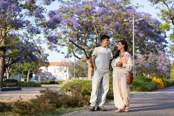 istock Mother and son walking in the park in spring 2225381642