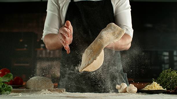 istock Freeze Motion of Chef Making Yeast Dough 2225383277