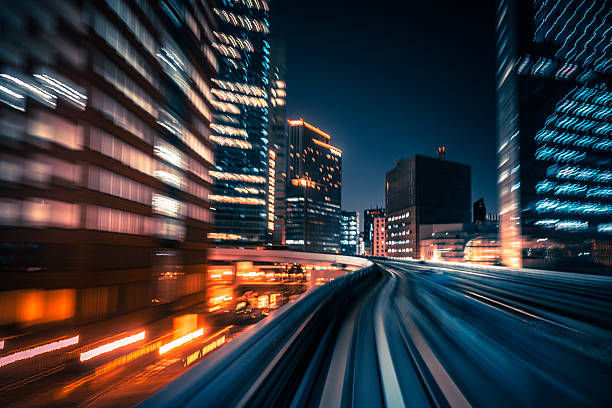 istock Dynamic Cityscape at Night Featuring Motion Blur and Futuristic Vibes 2225385651