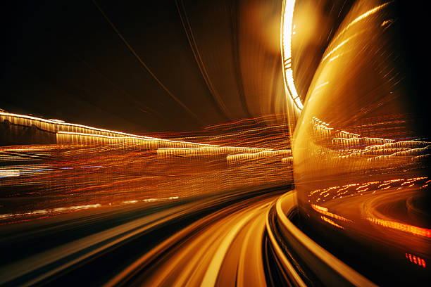 istock High-Speed Motion Blur Driving Through a Tunnel at Night in Tokyo 2225385778