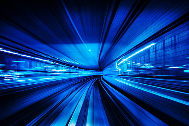 istock Futuristic High-Speed Motion in Tunnel with Vibrant Blue Lights 2225385841