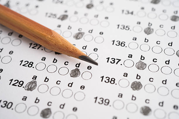 istock Answer sheets with pencil drawing fill to select choice, education concept. 2225387815