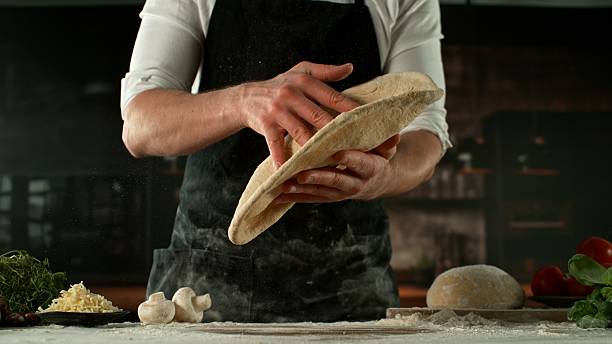 istock Freeze Motion of Chef Making Yeast Dough 2225391296