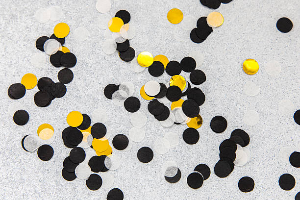 istock Colorful confetti scattered on a gray surface for celebration and decoration purposes 2225393871