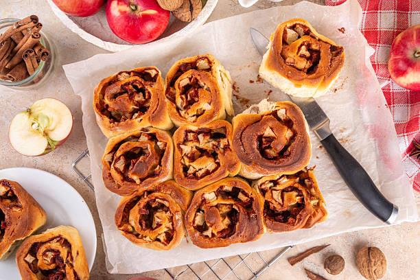 istock Apple cinnamon roll, sweet cinnabon buns with apple filling 2225397614