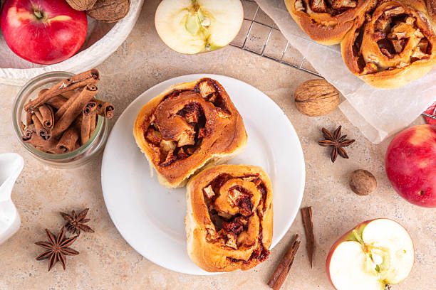 istock Apple cinnamon roll, sweet cinnabon buns with apple filling 2225397715