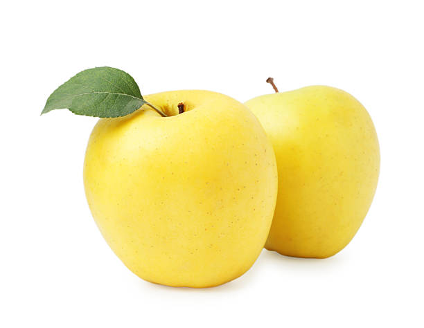 istock Fresh juicy yellow apples isolated on white 2225401546