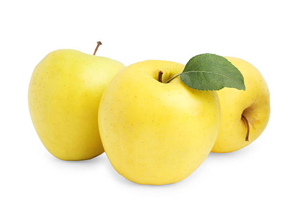 istock Fresh juicy yellow apples isolated on white 2225401559