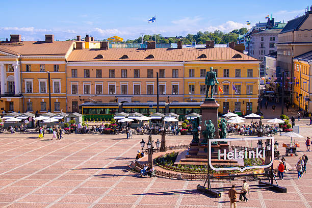 Helsinki, Finland - Jun 13th, 2025: Helsinki signboard with houses background from Helsinki Cathedral in Finland