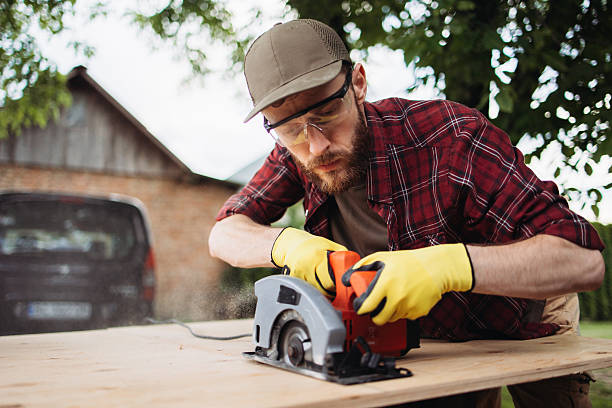 istock Man Using Circular Saw for Carpentry Project in Outdoor Setting 2225408296