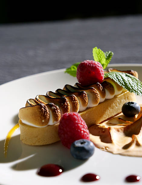 Citrus Elegance: Lemon Meringue Tart with Berries.