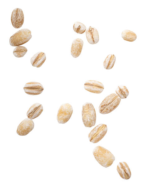 istock pearl barley isolated on white background macro 2225410080