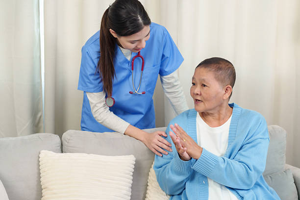 istock Elderly patient actively communicates with physiotherapist, discussing progress and receiving encouragement, fostering a strong sense of trust and partnership. 2225411564