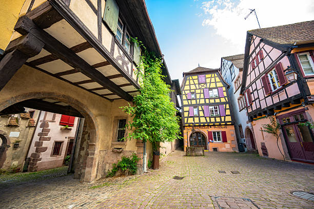 Beautiful colorful half timbered house of the village of Riquewihr in Alsace France