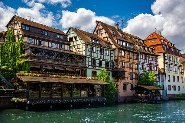 The beautiful Alsace city of Strasbourg France during summer - Colorful classic Alsacian architecture
