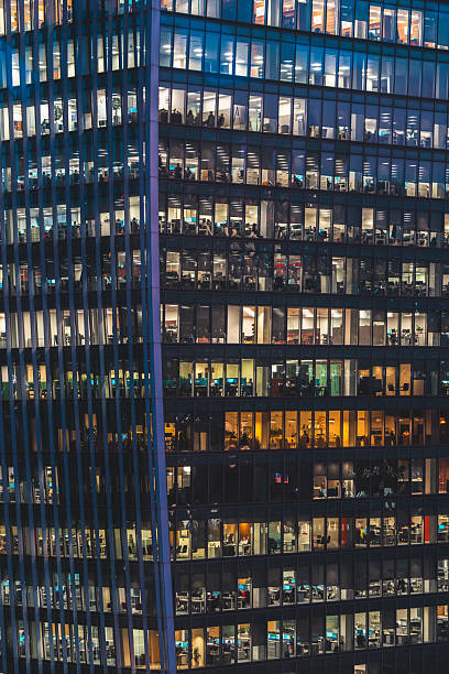 istock Illuminated office buildings in London 2225415270