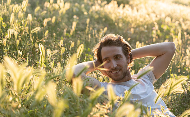 istock Young and fit man is relaxing outdoors with idyllic sunlight 2225418255