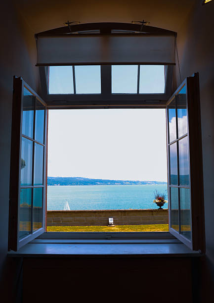 istock View of Lake Constance through an Open Window 2225419388