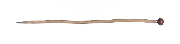 istock old wooden walking stick isolated on white background 2225420073