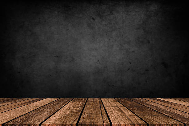 istock Wooden table in dark room background concept for advertising. 2225420988