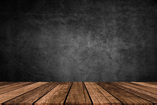 istock Wooden table in dark room background concept for advertising. 2225420991