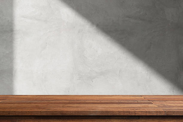 Empty wood, marble or stone table top with many blur backgrounds like tropical jungle, ocean, mountains, interior and sunsets in summer green. The table giving copy space for placing advertising product on the table along with beautiful forest banner background.