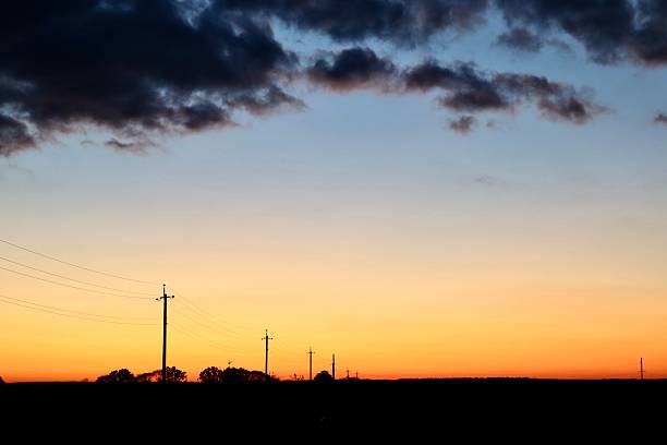 istock Silhouette of power lines at sunset. 2225423009