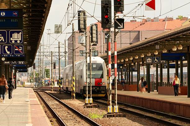 istock Red train on the track. Fast train. Railway station. 2225424775