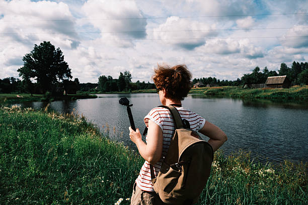 istock Female vlogger is exploring remote semi-abandoned village 2225434968