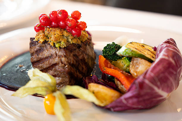 istock Gourmet beef fillet with red currants 2225439170