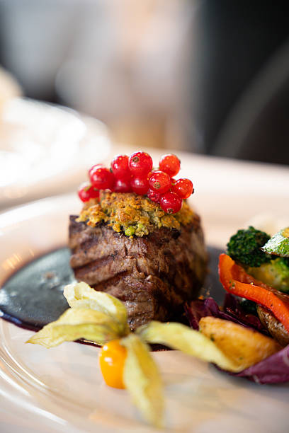 istock Gourmet beef fillet with red currants 2225439202