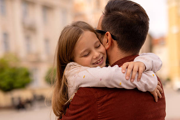 istock Cheerful Outdoor Moment Between Father and Daughter 2225441214