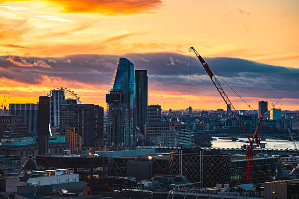 istock London skyline glowing at sunset with construction crane 2225446969