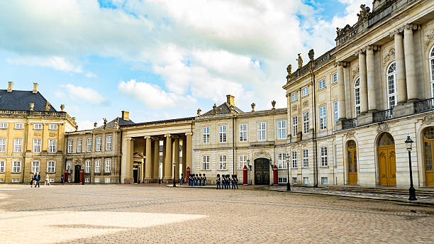 Copenhagen, Denmark -  June 2 2025: Royal palace courtyard with marching guards in Copenhagen
