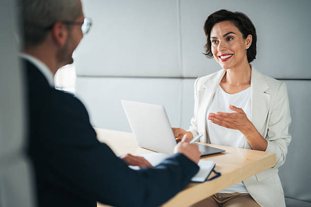 istock Professional business meeting between colleagues in a modern office 2225456701