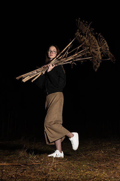 istock Woman hold dry hogweed 2225456903
