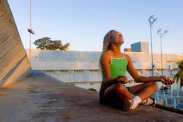 istock LGBTQIA+ girl in lotus pose 2225458536