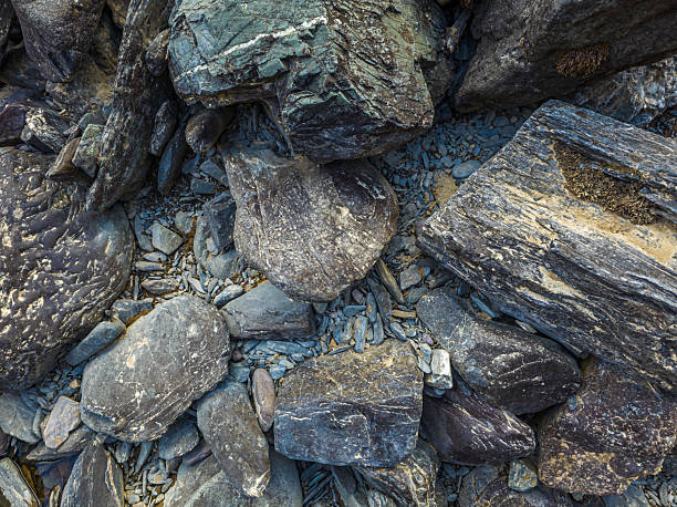 istock Various rocks on rugged ground in natural outdoor setting, high angle view 2225459165