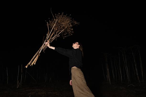 istock Woman hold dry hogweed 2225463929