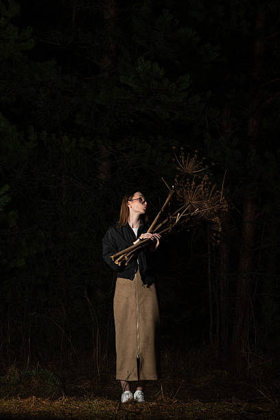 istock Woman hold dry hogweed 2225463930