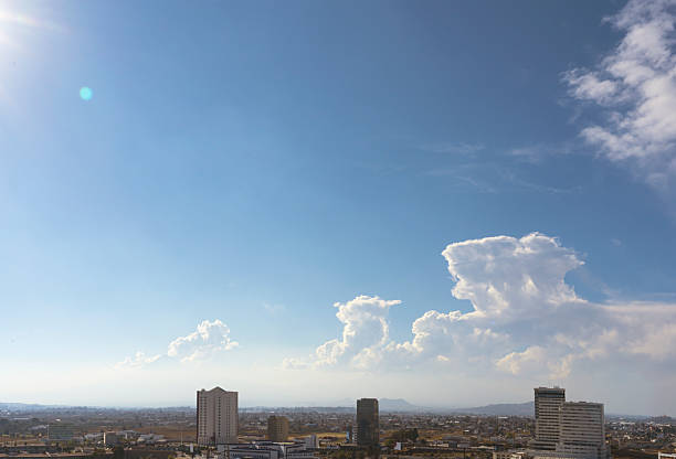 Beautiful panoramic view of Puebla city with skyline, clouds, Popocatepetl volcano, cityscape and mountain range