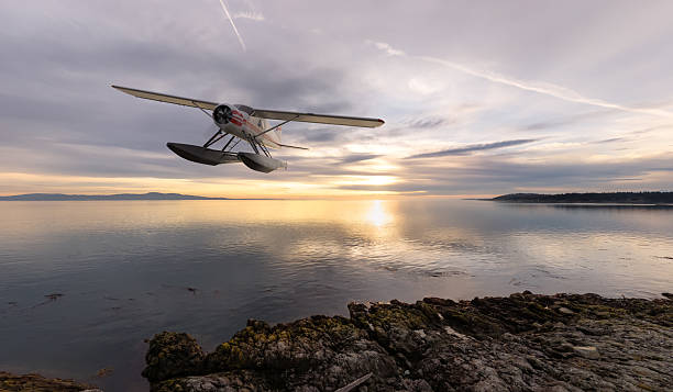 istock Seaplane Soaring Over Scenic Ocean Sunset on Vancouver Island 2225468612