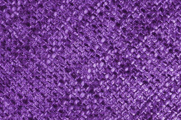 istock Closeup, macro texture of purple woven burlap fabric with thick threads and rough textile pattern 2225469206